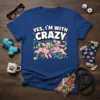 Yes, I'm With Crazy text with two cartoon poodles running on a blue t-shirt design