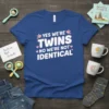 Yes We're Twins No We're Not Identical quote on a blue t-shirt, featuring pink birds and hearts