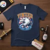 Navy t-shirt with "Yinzer Est 1900" text above a fierce eagle graphic, representing Pittsburgh pride