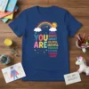 You Are Kind Brave Smart T-Shirt with colorful typography, rainbow, and sun graphic. Inspirational message for women