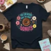 T-shirt design with the text "YOU CAN NEVER HAVE TOO MANY DONUTS" surrounded by colorful donuts and sprinkles