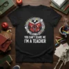 Teacher t-shirt with "You Can't Scare Me I'm A Teacher" text and a cartoon book graphic