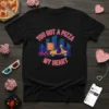 You Got A Pizza My Heart text with a pizza delivery scooter and hearts on a black t-shirt