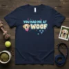 You Had Me At Woof t-shirt design featuring a happy golden retriever face and playful typography