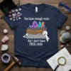 T-shirt with "You have enough rocks But I don't have THESE rocks" quote and cartoon character pointing at crystals