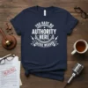 Navy blue t-shirt with white text "YOU HAVE NO AUTHORITY HERE JACKIE WEAVER" in a circular design with lightning bolt