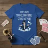 Blue t-shirt with white text "YOU LOSE! YOU GET NOTHING! GOOD DAY SIR!" and a cartoon magician graphic