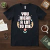 T-shirt with white bold text "YOU MEAN A LOT TO ME" surrounded by floral graphics and hands