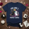 You And I Perfect Couple text with black and white cats holding flowers design on a navy t-shirt