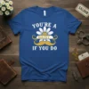 Blue t-shirt with white text "You're a Daisy If You Do" and a yellow mustache with a daisy graphic in