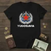 YUGOSLAVIA text with retro socialist emblem, red star, and laurel wreath on black t-shirt