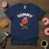 Yummy Donut Baker bold graphic design printed on comfortable cotton t-shirt