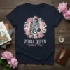Zebra Queen Wild & Free t-shirt design featuring a zebra head in a floral wreath with text