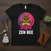 Zen Bee t-shirt with a cartoon bee meditating on a lotus flower, set against a sunset mandala background