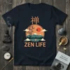 Zen Life t-shirt with a serene landscape design featuring a Japanese kanji, bamboo, mountains, a lotus pond, and a sunset