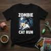 Zombie Cat Run t-shirt design featuring a white cat running from a zombie under a full moon
