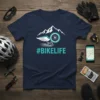 Navy blue t-shirt with #BIKELIFE hashtag, mountain graphic, and winged bicycle wheel design
