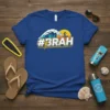 #BRAH hashtag design with a crashing wave and surfer silhouette on a blue t-shirt