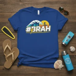 #BRAH hashtag design with a crashing wave and surfer silhouette on a blue t-shirt