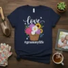 Navy t-shirt with "love" and "#grammylife" text surrounding a basket of colorful flowers and butterflies