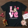 #Happy Valentine t-shirt design featuring a Saint Bernard dog wearing a pink hat and holding balloons, with the word LOVE