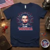 'Merica t-shirt design with Abraham Lincoln portrait and patriotic fireworks graphic, navy blue tee