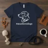 Navy blue t-shirt with white #mustlovedogs hashtag and stylized dog head graphic
