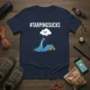 T-shirt with #TarpingSucks text and a cartoon of a grumpy cloud pouring water on a tent