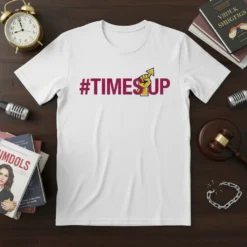 White t-shirt featuring the "#TIMESUP" slogan in maroon text with a raised fist graphic