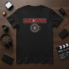 Black t-shirt with #VIDEOGRAPHER hashtag and camera lens graphic, perfect for videographers