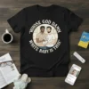 "Whose God Damn White Baby Is This?" quote t-shirt design featuring two men holding a baby, white text in circle