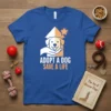 Adopt a Dog Save a Life t-shirt featuring a graphic of a dog's face being held in a hand inside