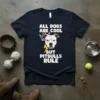 T-shirt with "ALL DOGS ARE COOL BUT PITBULLS RULE" text and a pitbull graphic wearing a crown and lightning bolt