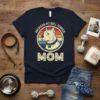 American Pit Bull Terrier Mom t-shirt design with a vintage pit bull graphic and distressed "MOM" text