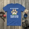 Be The Person Your Dog Thinks You Are t-shirt with paw print graphic and silhouette of person and dog
