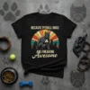 Black t-shirt with retro sunset design featuring a pitbull dog and text "BECAUSE PITBULL DOGS ARE FREAKING Awesome"