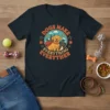 T-shirt with "Dogs Make Everything Everyther" text and a smiling golden retriever wearing a red cape