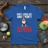 Pitbull owner t-shirt with text "Don't Judge My Pitbull And I Won't Judge Your Kids" and cartoon pitbull graphic