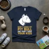 Navy t-shirt featuring white pitbull head graphic and yellow text "Don't Judge My Pitbull and I Won't Judge Your Kids"
