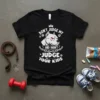 Don't Judge My And I Won't Judge Your Kids text design with a pitbull graphic on a black t-shirt