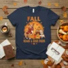 Fall Reads & Good Deeds t-shirt featuring a pitbull wearing a scarf, books, pumpkins, and autumn leaves
