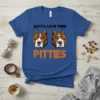 Gotta Love Them Pitties t-shirt with two pitbull dog faces and bold orange text