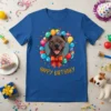 Happy Birthday Dog T-Shirt with a smiling staffordshire bull terrier surrounded by colorful balloons and confetti