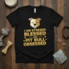 T-shirt with gold text "I Am Stressed Blessed And Pitbull Obsessed" and a happy pit bull graphic