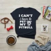 Navy t-shirt with white text "I CAN'T i have to PET MY PITBULL" and a graphic of a smiling pitbull