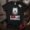 Black t-shirt with "I Love My Pitbull" text and a pitbull dog graphic, white typography, red heart symbol