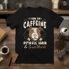 T-shirt with bold text "I RUN ON CAFFEINE PITBULL HAIR & CUSS WORDS" above a pitbull dog face graphic