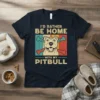 I'd Rather Be Home With My Pitbull text design with a cartoon pitbull wearing a heart and holding bones, on