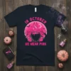 In October We Wear Pink t-shirt design with a pink ribbon, cauldron, bats, and pumpkins, symbolizing breast cancer awareness