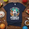 It's not a party until a few Pitbulls show up text with illustrations of pitbull dogs in party hats